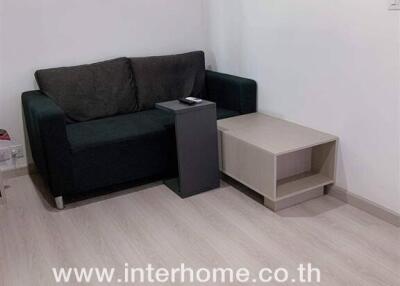 Small living room with sofa and coffee table