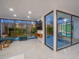 Modern living area with pool view