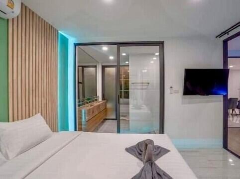 Modern bedroom with adjoining bathroom