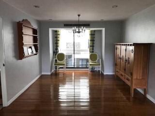 Living room with wooden floor and furniture