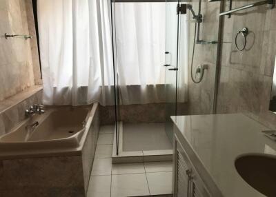 Bathroom with bathtub and walk-in shower