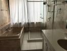 Bathroom with bathtub and walk-in shower