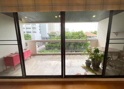 Spacious balcony with plants and a view