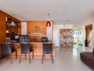 Modern office reception area with desk, chairs, and décor