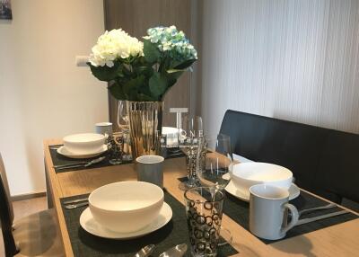 Modern dining area with a set table