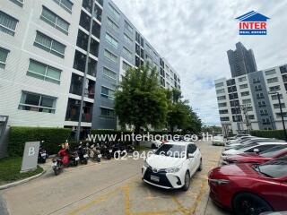 Parking area and exterior view of apartment complex