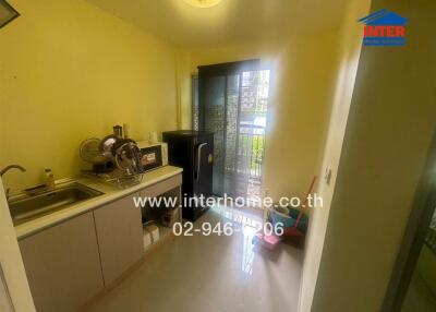 Small kitchenette with essential appliances