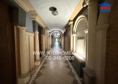 Elegant hallway with arches and ambient lighting