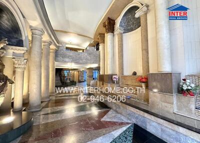 Main entrance lobby with decorative columns and intricate flooring