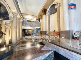 Main entrance lobby with decorative columns and intricate flooring