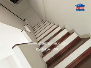 Indoor staircase with wooden steps