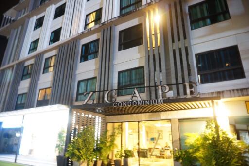 Condominium exterior at night