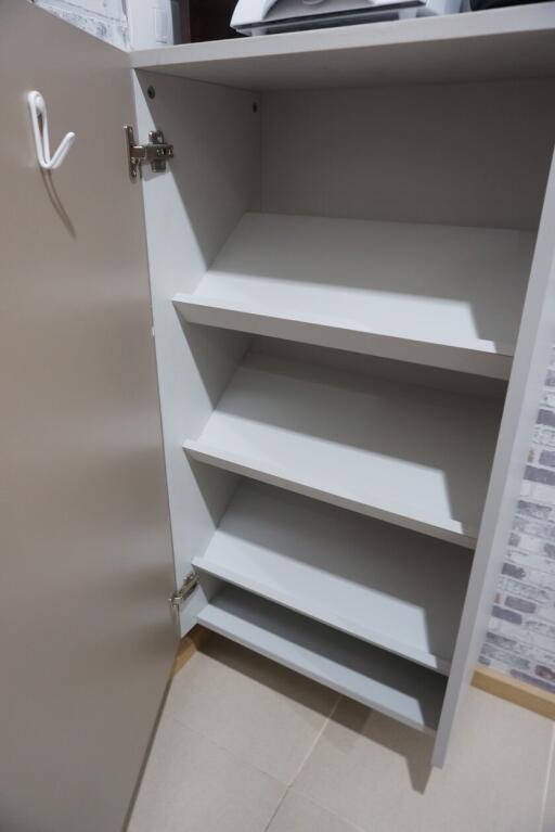 Open storage cabinet with shelves