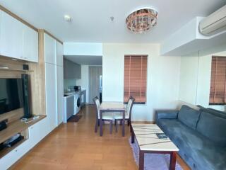 Modern living room with kitchen and dining area