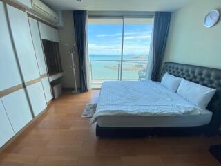 Bedroom with ocean view from large window