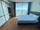 Bedroom with ocean view from large window
