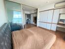 Spacious bedroom with a view and modern amenities