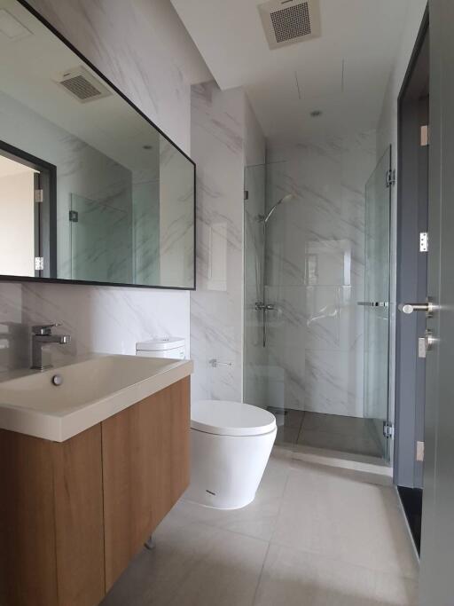 Modern bathroom with a shower and vanity