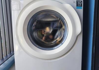 Washing machine in a laundry area