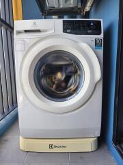 Washing machine in a laundry area