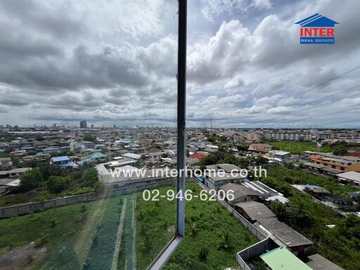 View from high-rise building overlooking a residential neighborhood