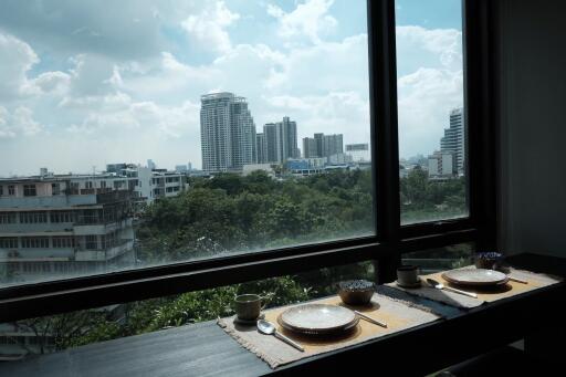 Dining area with a view of the city skyline