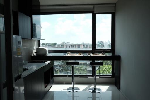 Modern kitchen with large windows and view