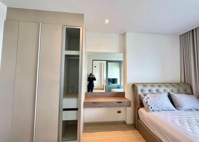 Modern bedroom with wardrobe and vanity