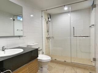 Modern bathroom with glass shower enclosure