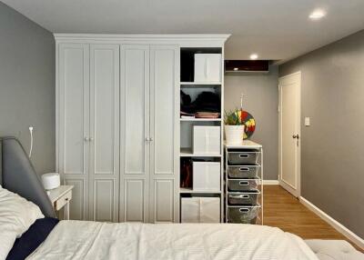 Spacious bedroom with built-in wardrobes and storage
