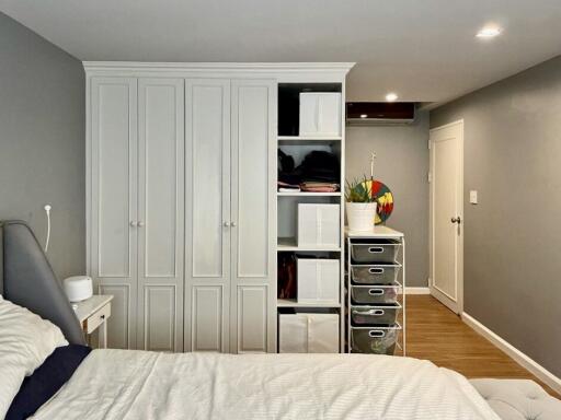 Spacious bedroom with built-in wardrobes and storage