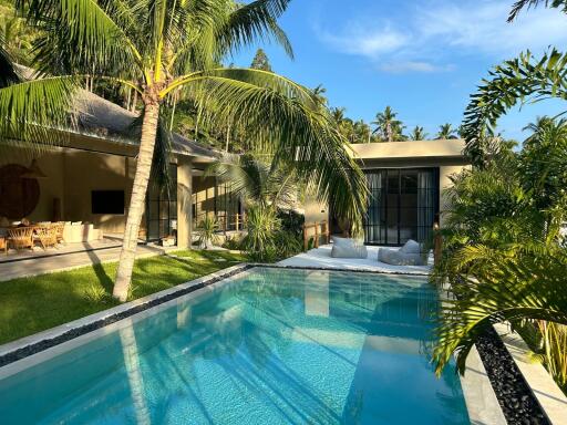 Outdoor area with pool and seating