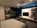 Modern bedroom with wall-mounted TV and shelves