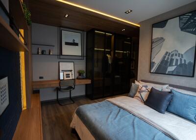 Modern bedroom with wooden accents and large closet