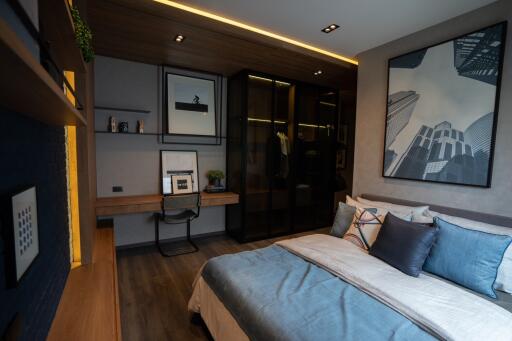 Modern bedroom with wooden accents and large closet