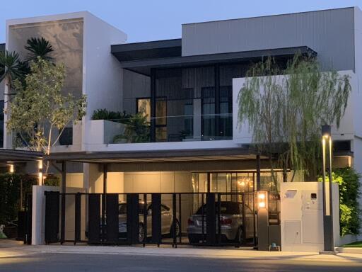 Modern two-story house with a carport