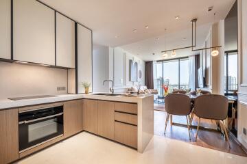 Modern open-plan kitchen and dining area with living room