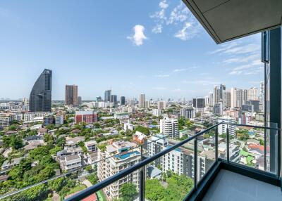 High-rise city view from a balcony