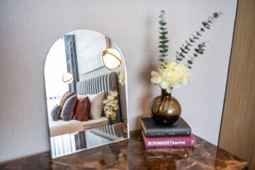 Bedroom with decorative elements on a dresser