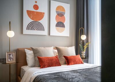 Modern bedroom with abstract artwork and cozy lighting