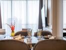 Elegant dining area with glass table setting