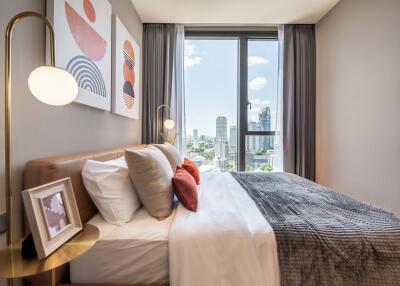 Bright modern bedroom with city view