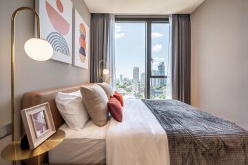 Bright modern bedroom with city view