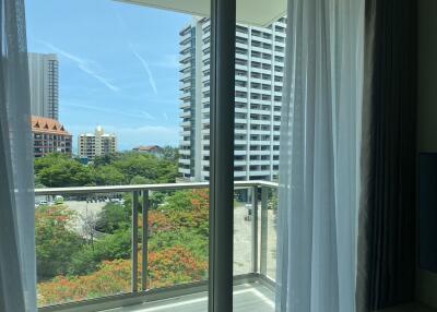 View from balcony with buildings and trees