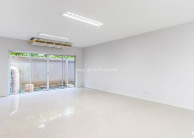 Bright and spacious living room with large windows