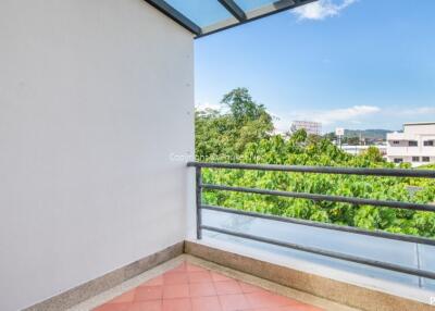 Spacious balcony with railing and scenic view