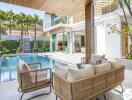 Modern outdoor living area with pool and seating