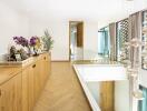 Spacious modern hallway with wooden cabinets and decorative elements