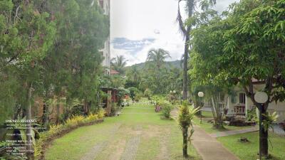 Outdoor garden area with building view