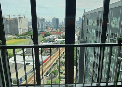 View from a balcony overlooking a cityscape